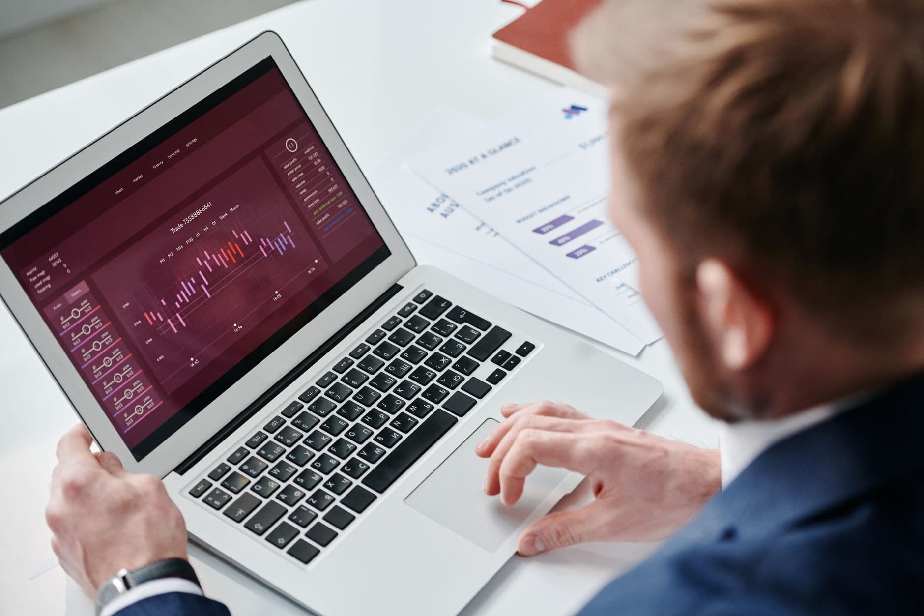 Business owner reviewing real-time financial dashboard on a laptop