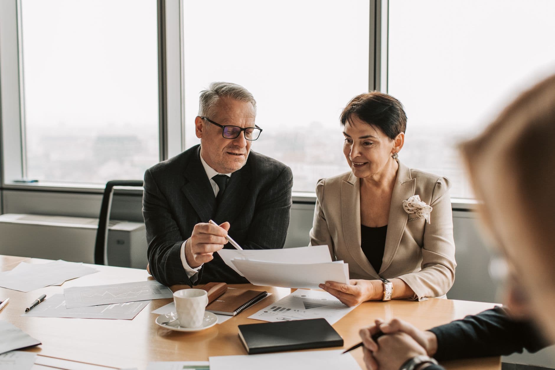 Advisor meeting with an attorney reviewing trust account documents