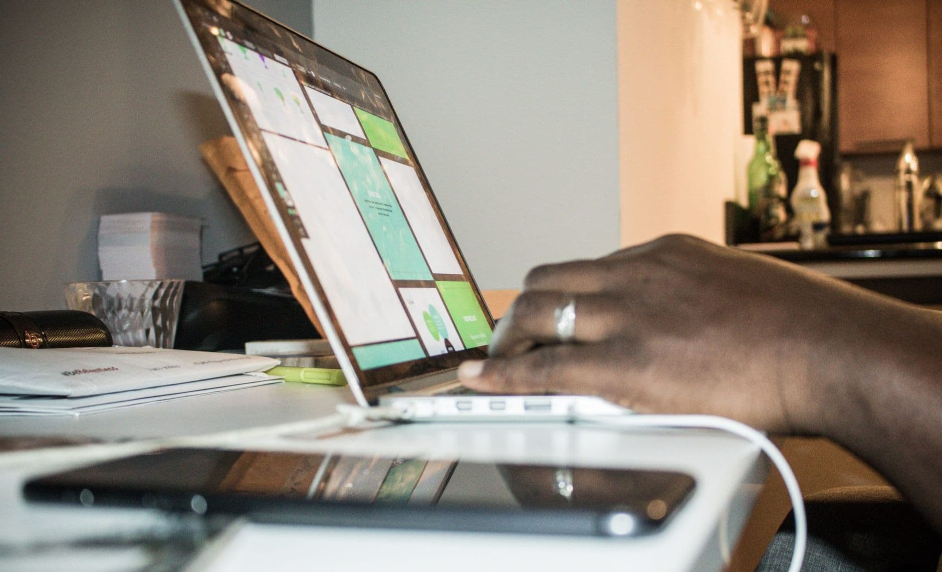 Client uploading tax documents through a secure online portal on a laptop